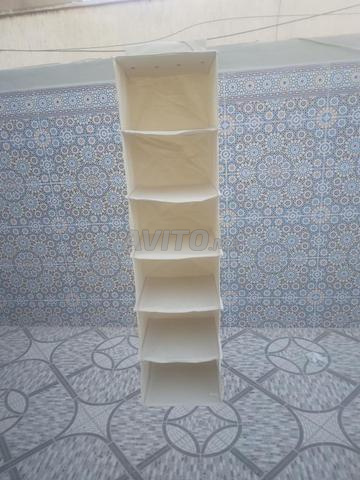 Rangement pour textiles, vêtements. - 2