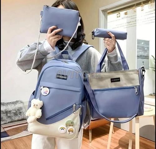 حقيبة مدرسية بها ألوان مكونة من 5 قطع - 2