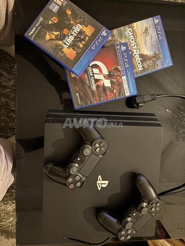 PS4 Pro 1TB - Volant - 11 Jeux - 2 Manettes - 2