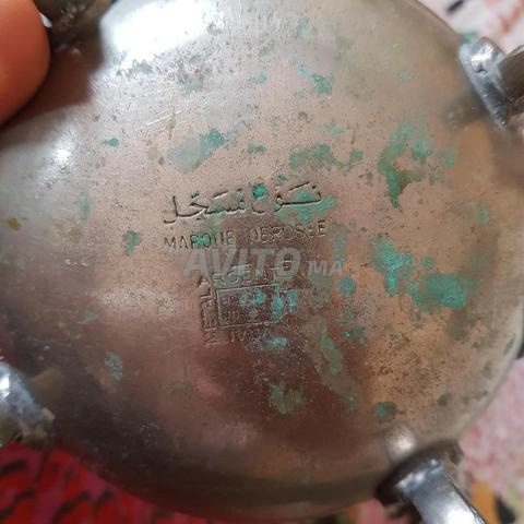 Ancien réfrigérateur en cuivre, plus de 50 ans