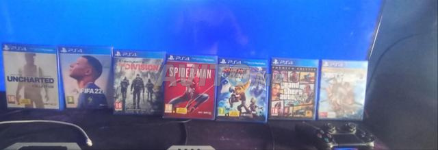 PS4 Slim 500Go Original à jour avec 7 jeux CD - 2