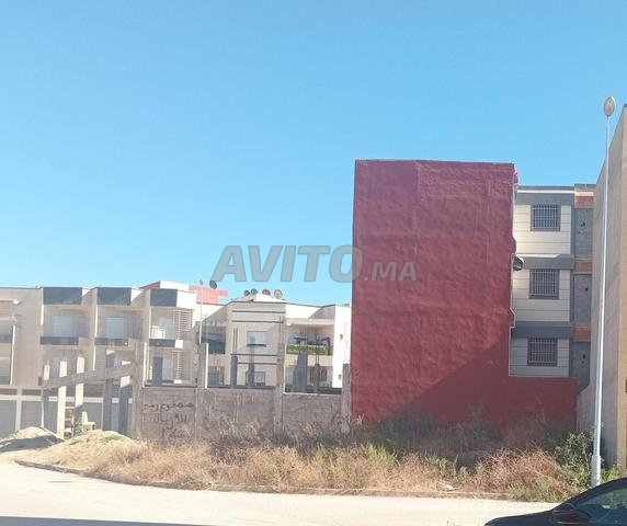 بقعة تجارية للبيع، حي الورود، بوزنيقة