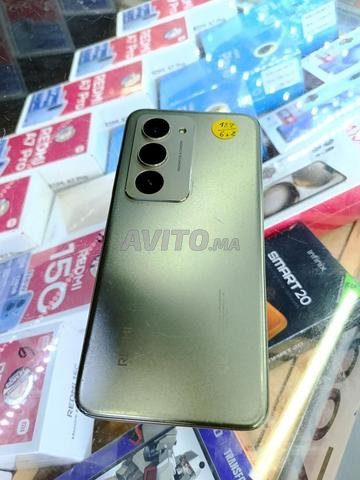 Prix 1400 dirhams téléphone en bon état version 2026 encore propre