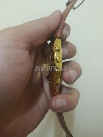Montre Swatch dorée à vendre - Casa Oulfa - 2