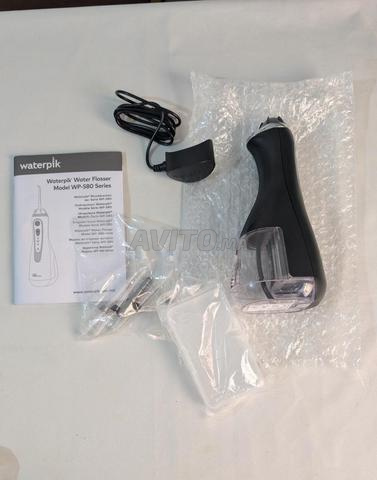 جهاز Waterpik لتنظيف الأسنان بالماء - 2