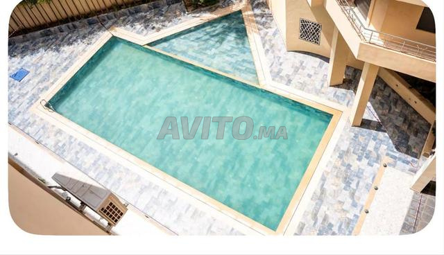 Joli appartement neuf avec piscine et parking