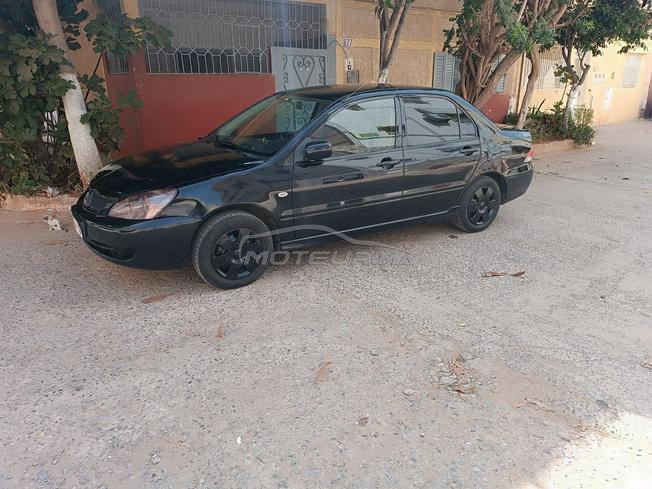 Mitsubishi lancer essence 