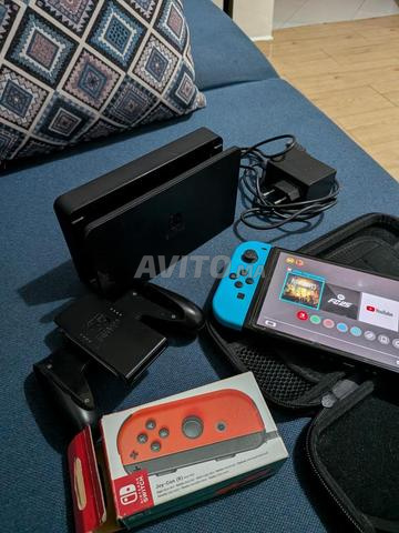 نينتندو سويتش OLED مع ملحقات - 2