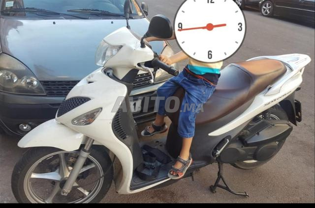 سكوتر سوزوكي 125 - 2