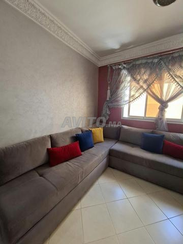 Salon moderne en U avec rangement à vendre - 2