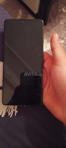 Redmi Note 13 Pro encore neuf avec son chargeur - 2