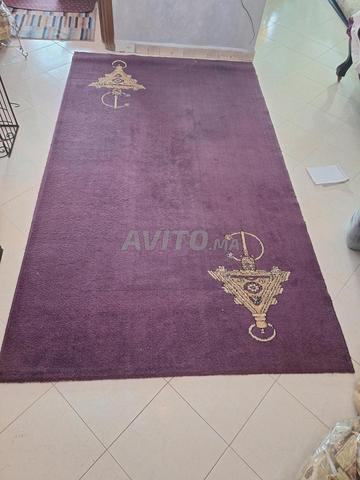Tapis moderne encore en bon état - 2