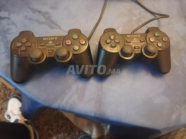 2 manettes PS2 - 2