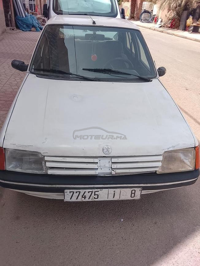سيارة بيجو 205جيدة 13000dh