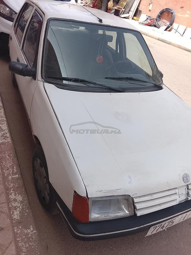 سيارة بيجو 205جيدة 13000dh
