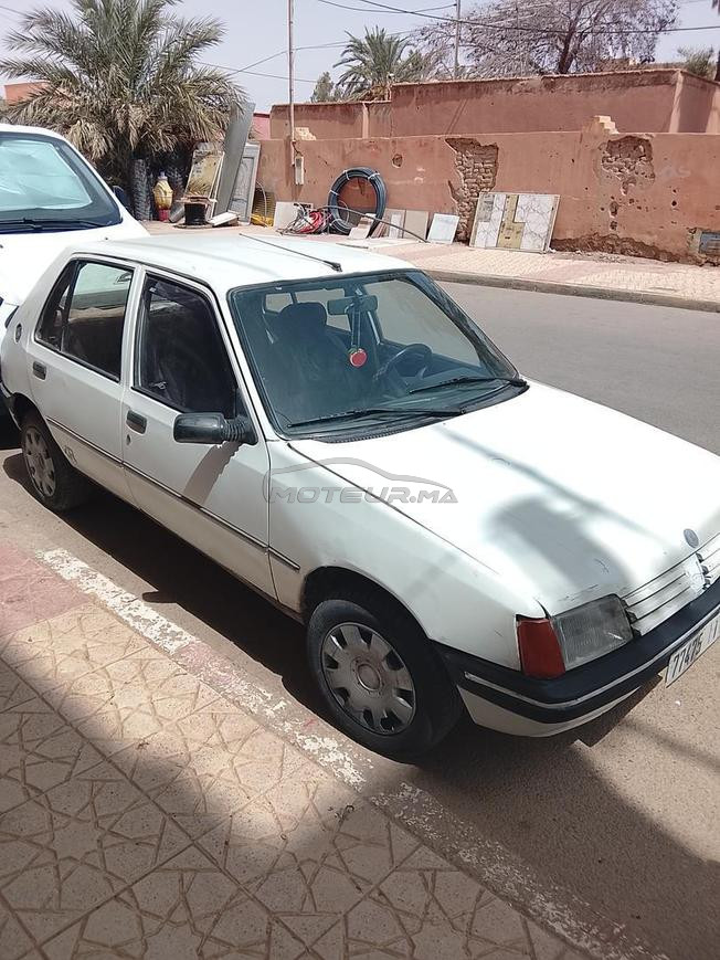 سيارة بيجو 205جيدة 13000dh