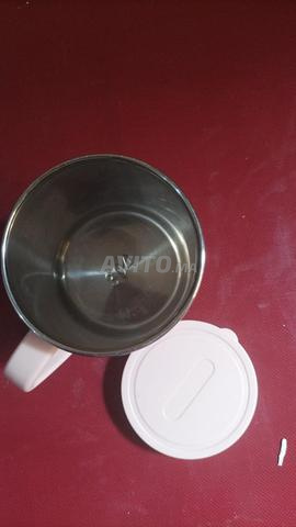 Thermos mignon rose qui garde la boisson chaude - 2