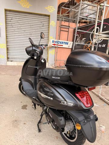Moto - 2