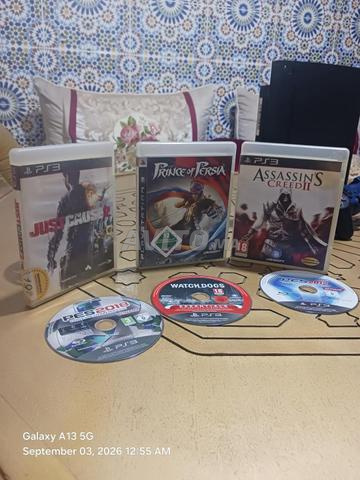 PS3 Super Slim 500Go, 2 manettes, 6 jeux, CD - 2