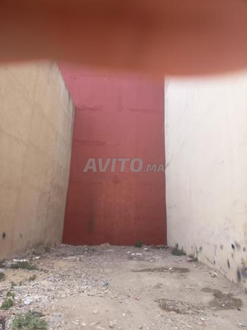 طنجة الأمل أرض 126م2 تحمل سند ملكية - 2
