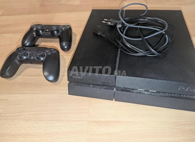 PlayStation 4 Slim avec 2 Manettes Très bon état