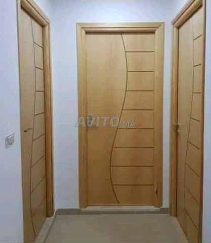 Fabrication de portes en bois modernes à Tanger