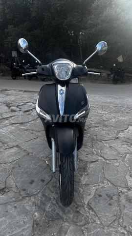 بيلاجيو ليبرتي ABS 125 i-Get (لوحة صغيرة) - 2