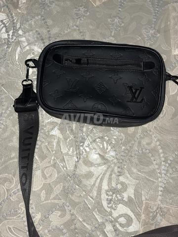 Louis Vuitton encore neuf