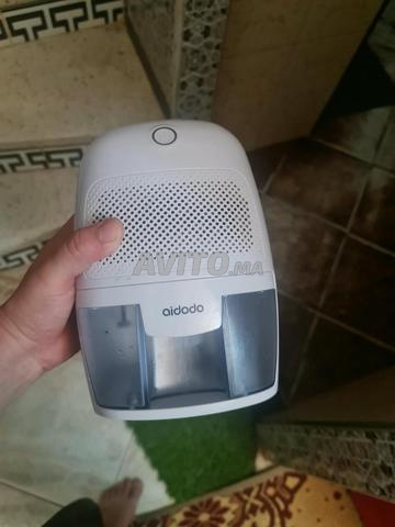 الجهاز هو مزيل رطوبة صغير (Mini Dehumidifier) - 2