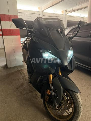 T max 560 tech max akrapovich - 2