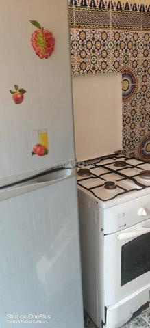 ثلاجة وطباخ
