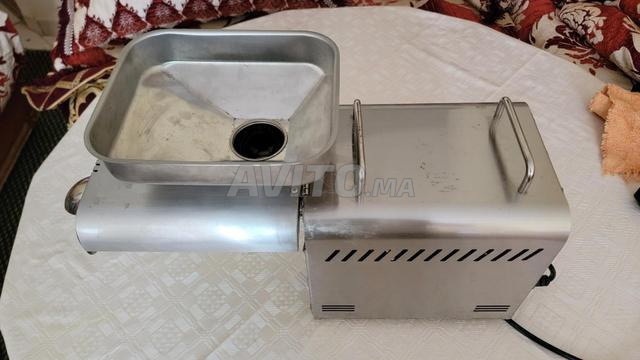 آلة لاستخراج زيوت الأعشاب - 2