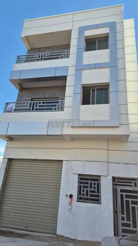 Maison composée de R2. Deux façades - 2