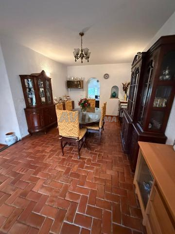 Belle villa en bande sur un grand boulevard