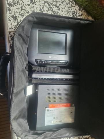 Lecteur DVD/CD portable avec écran séparé. - 2