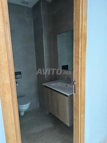 Appartement à louer 99 m² à Bouskoura - 2