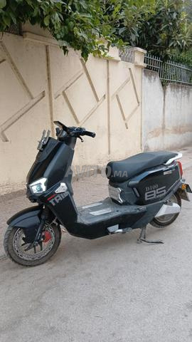 Moto électrique 100km charge queue 100 - 2