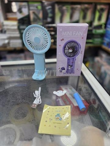 Petit ventilateur portable au design attrayant. - 2