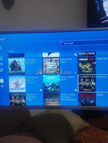PS4 Pro 2 manettes 867Go 99 jeux compris PS Plus - 2