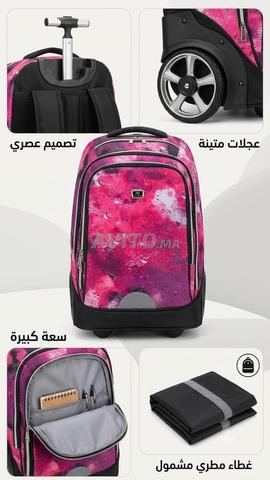 Sac à dos scolaire robuste avec roues, quasi neuf