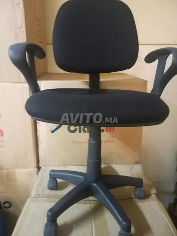 Fauteuil secrétaire en tissu sur roulettes