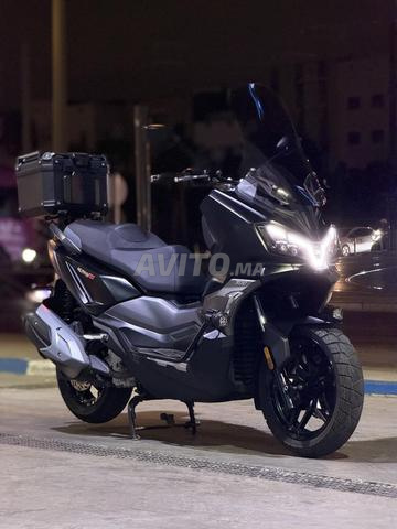 Moto SYM ADV Husky - 2