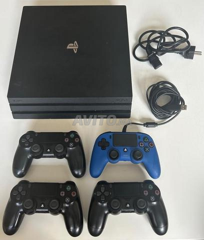 PS4 Pro 1TB  4 Manettes Câbles - 2