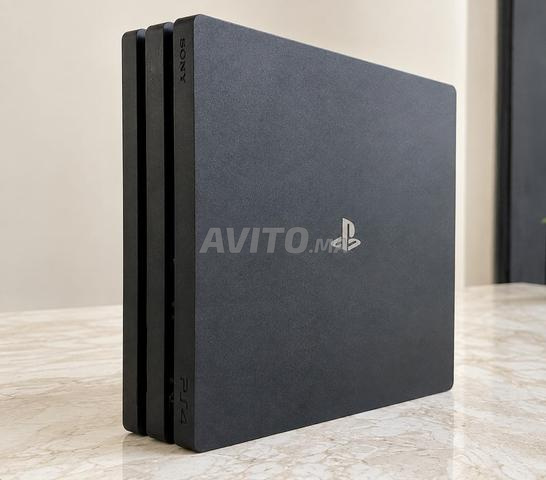 PS4 Pro 864Go état neuve jeux à payer à ton choix - 2