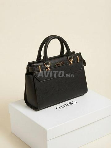 حقيبة Guess الأنيقة مع علبة GS7450 - 2
