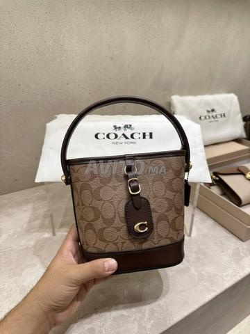 حقيبة أنيقة Coach CO9540 - 2