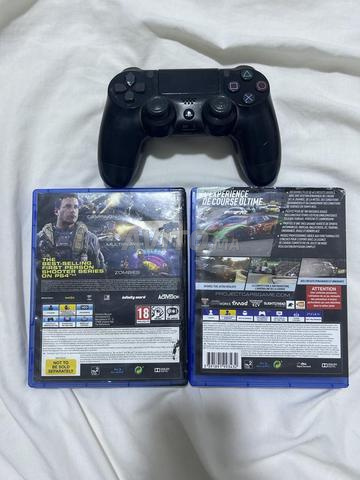 2 CD de jeux et une manette  - 2