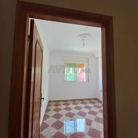 Appartement 4 pièces 102 m² avec ascenseur, syndic et balcon sur rue