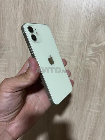 iPhone 12 officiel 64/88 état - 2