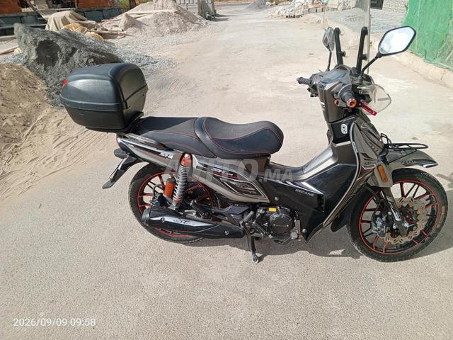 n9iya 18 600. km  gris 9000 bican sh. - 2